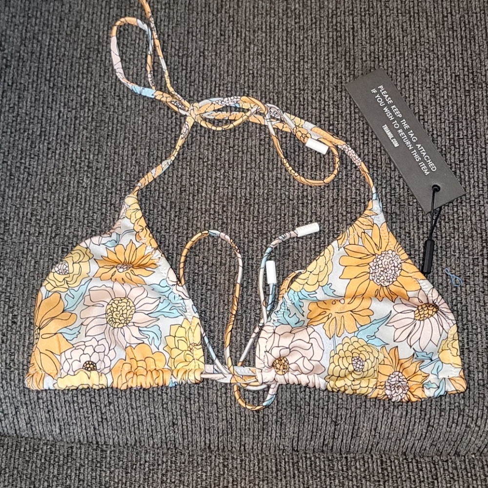 Brand new size Lg. Triangl top